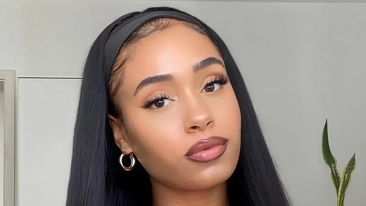 A smiling woman wearing a Mimicing long straight black headband glueless wig, styled for a natural and effortless everyday look.