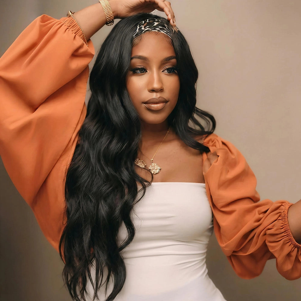 Mimicing Body Wave headband glueless virgin hair wig styled with a leopard print headband, featuring a woman in a chic orange and white outfit posing against a neutral studio background to highlight the soft, voluminous waves.