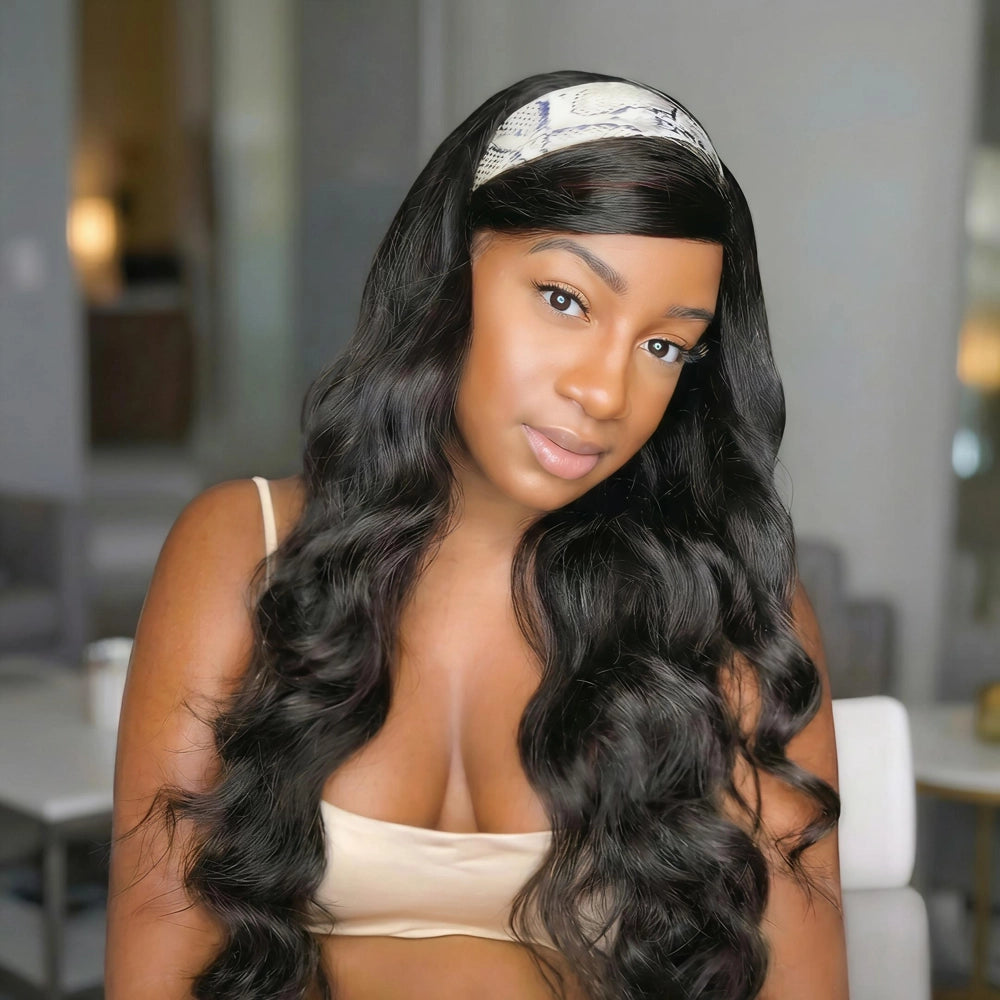 Mimicing Body Wave headband glueless virgin hair wig styled with a chic snakeskin patterned headband in a modern indoor setting, highlighting long, flowing wavy hair for a natural and elegant everyday look.