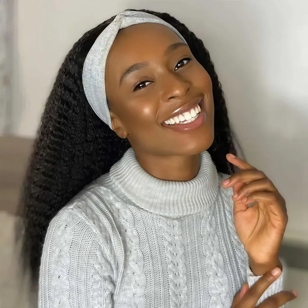 Smiling model wearing a Mimicing kinky straight headband wig with a light grey twisted headband, featuring beginner-friendly virgin hair in a wear and go style.