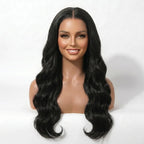 Mannequin head with long black wavy hair on a white background, wearing a Mimicing human hair body wave skin lace glueless wig.